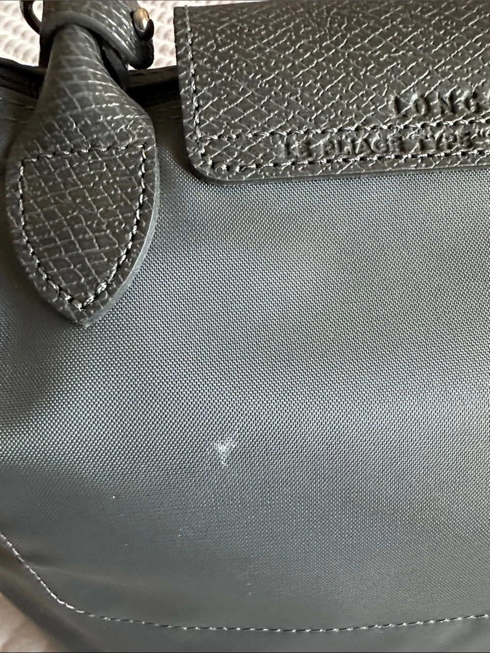 Longchamp supports info out